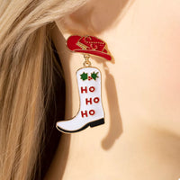 Christmas Cowboy Hat and Boot Dangle Earrings featuring vibrant colors and festive 'HO HO HO' design.