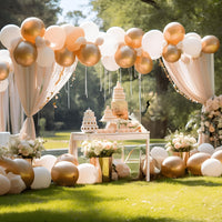 a table with a cake and balloons on it