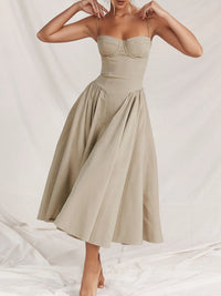 Ruched sweetheart neck cami dress in beige, featuring a flowy skirt and adjustable straps.