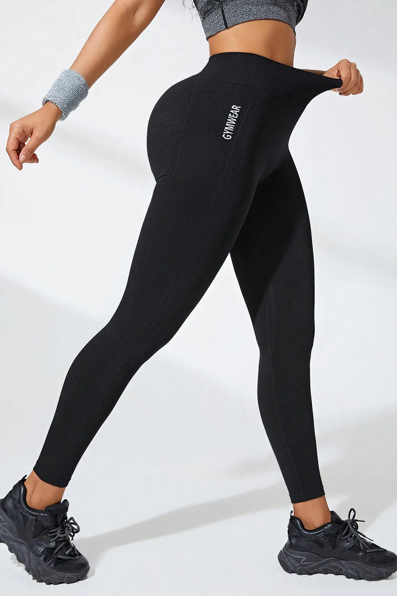 High waist active leggings in black, designed for comfort and stretch, ideal for workouts and casual wear.