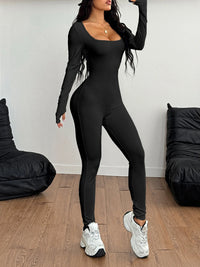 Black square neck long sleeve active jumpsuit, perfect for affordable activewear, styled with sporty shoes.
