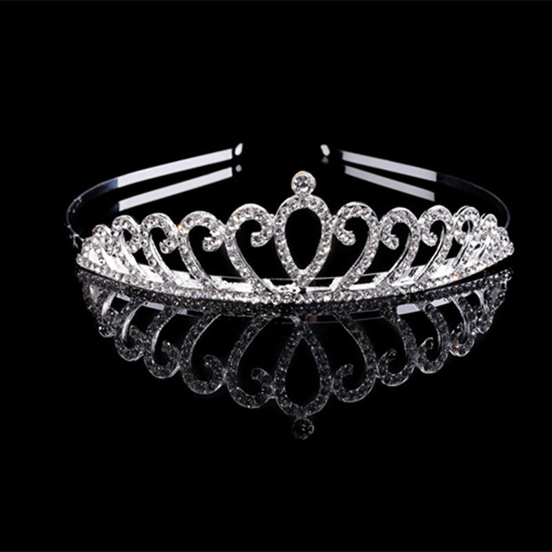 a tiara on a black background