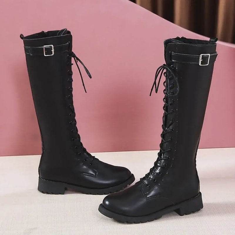 Elegant black leather lace-up combat boots with low heels, perfect for luxurious weddings and formal wear.