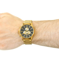 Nixon Sentry Chrono All Gold & Black Men's Watch A386-510 worn on wrist.