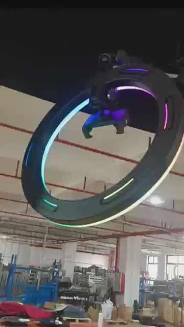 a large circular light hanging from the ceiling