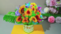 a vase filled with colorful flowers on top of a table