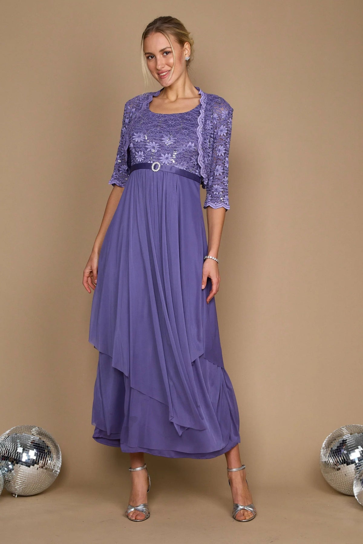 Plus size long formal Mother of the Bride jacket dress in lavender with sequin bodice and sheer lace sleeves.