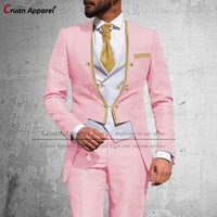 a man in a pink suit and gold tie