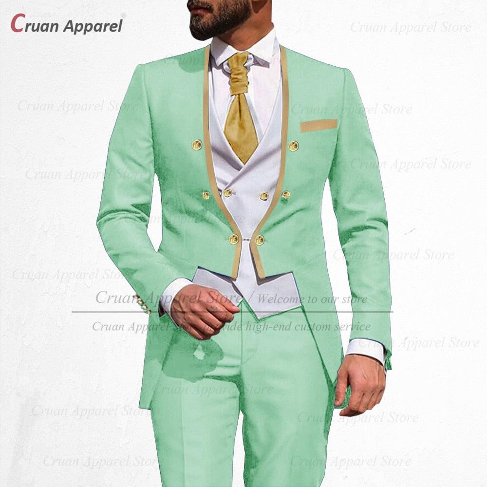 a man in a green suit and gold tie