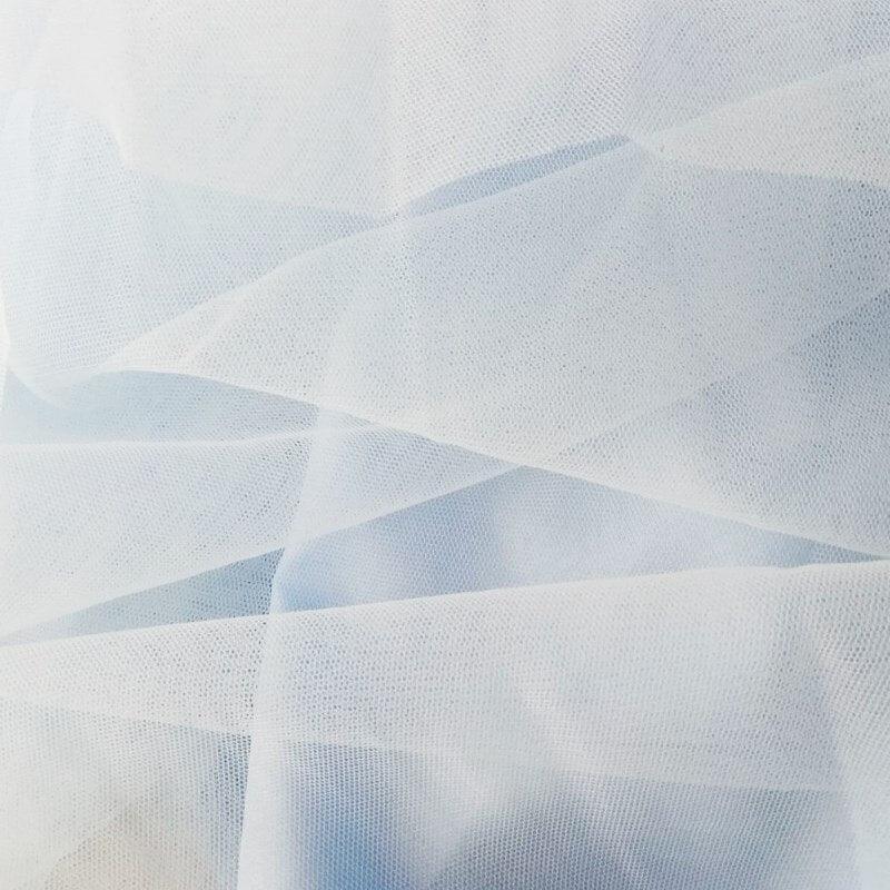 a close up of a white sheer fabric