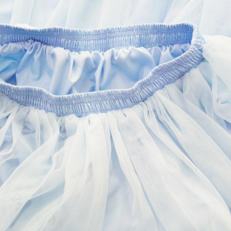 a close up of a blue and white dress